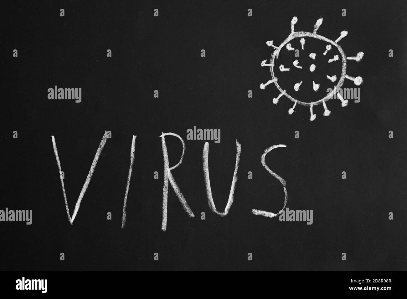 palabra de virus y simple tiza dibujo en pizarra Foto de stock