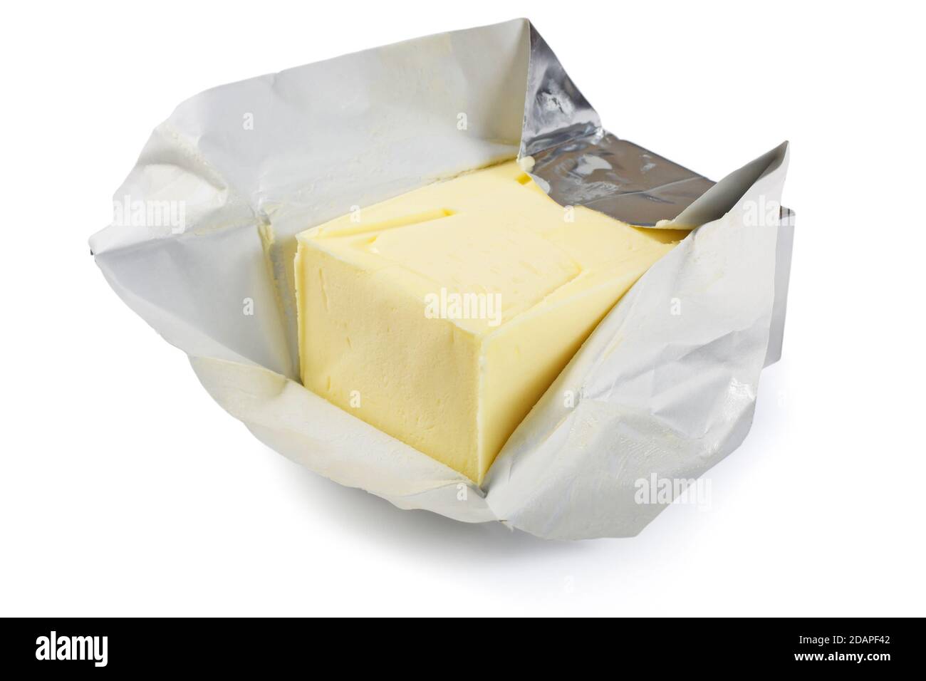 Cubo de mantequilla aislado sobre fondo blanco Foto de stock