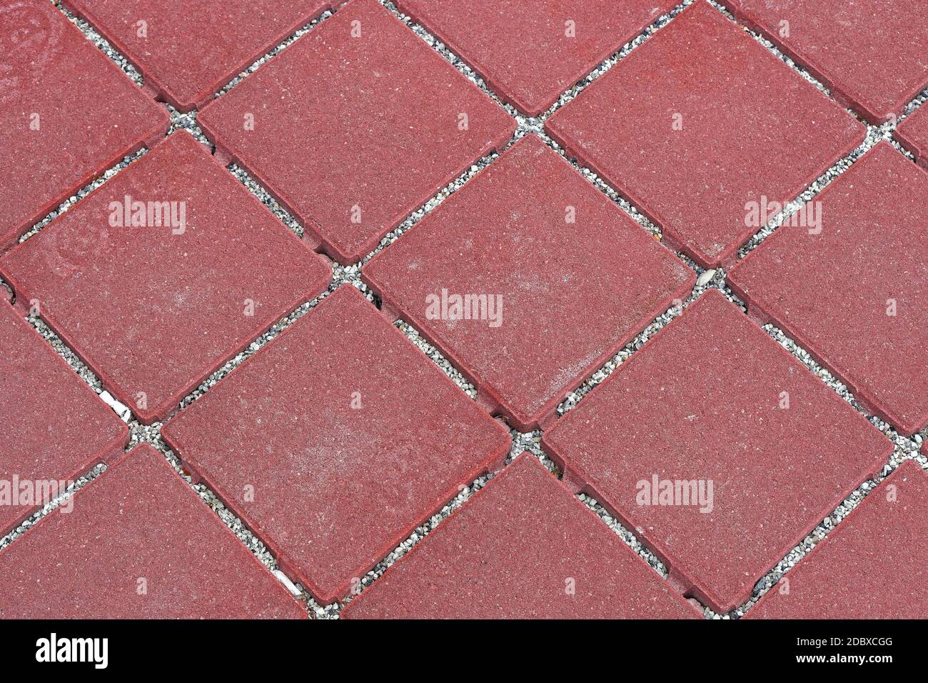 Mosaico de piedra roja patio exterior baldosas Fotografía de stock - Alamy