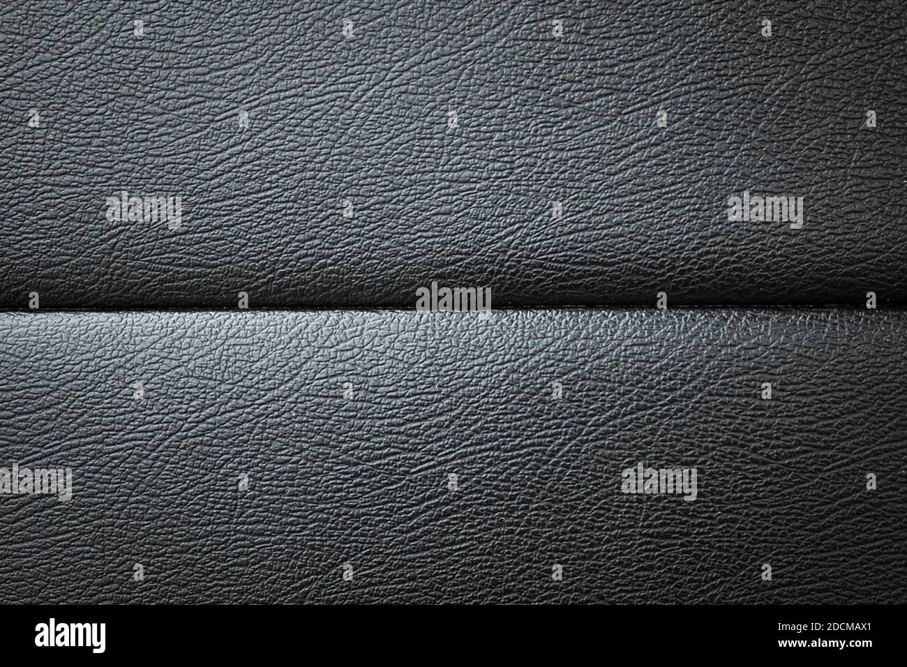 La textura de cuero del sofá negro se puede utilizar como fondo Foto de stock