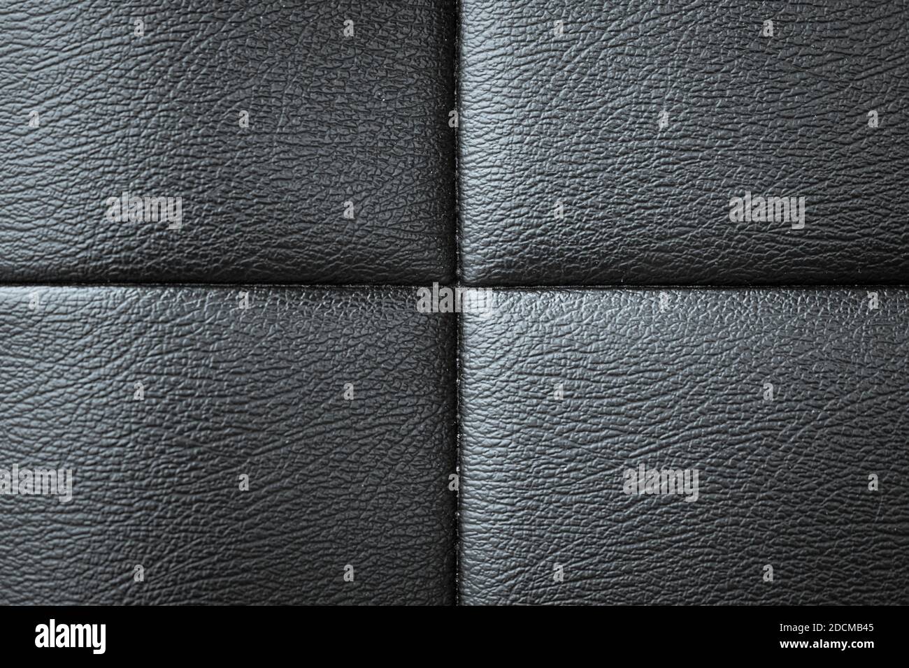La textura de cuero del sofá negro se puede utilizar como fondo Foto de stock
