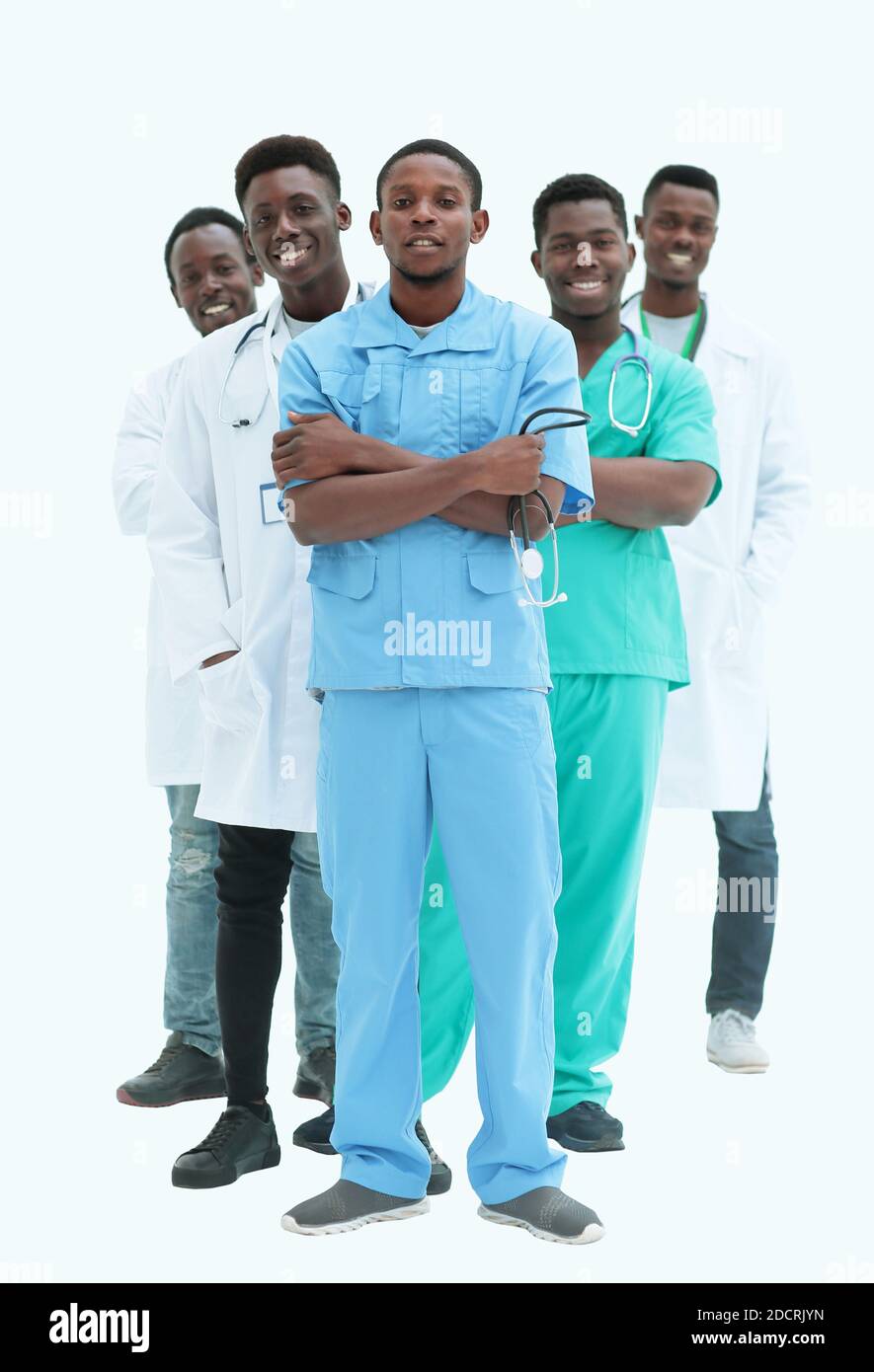 En pleno crecimiento. sonriente joven médicos de pie uno por uno Foto de stock