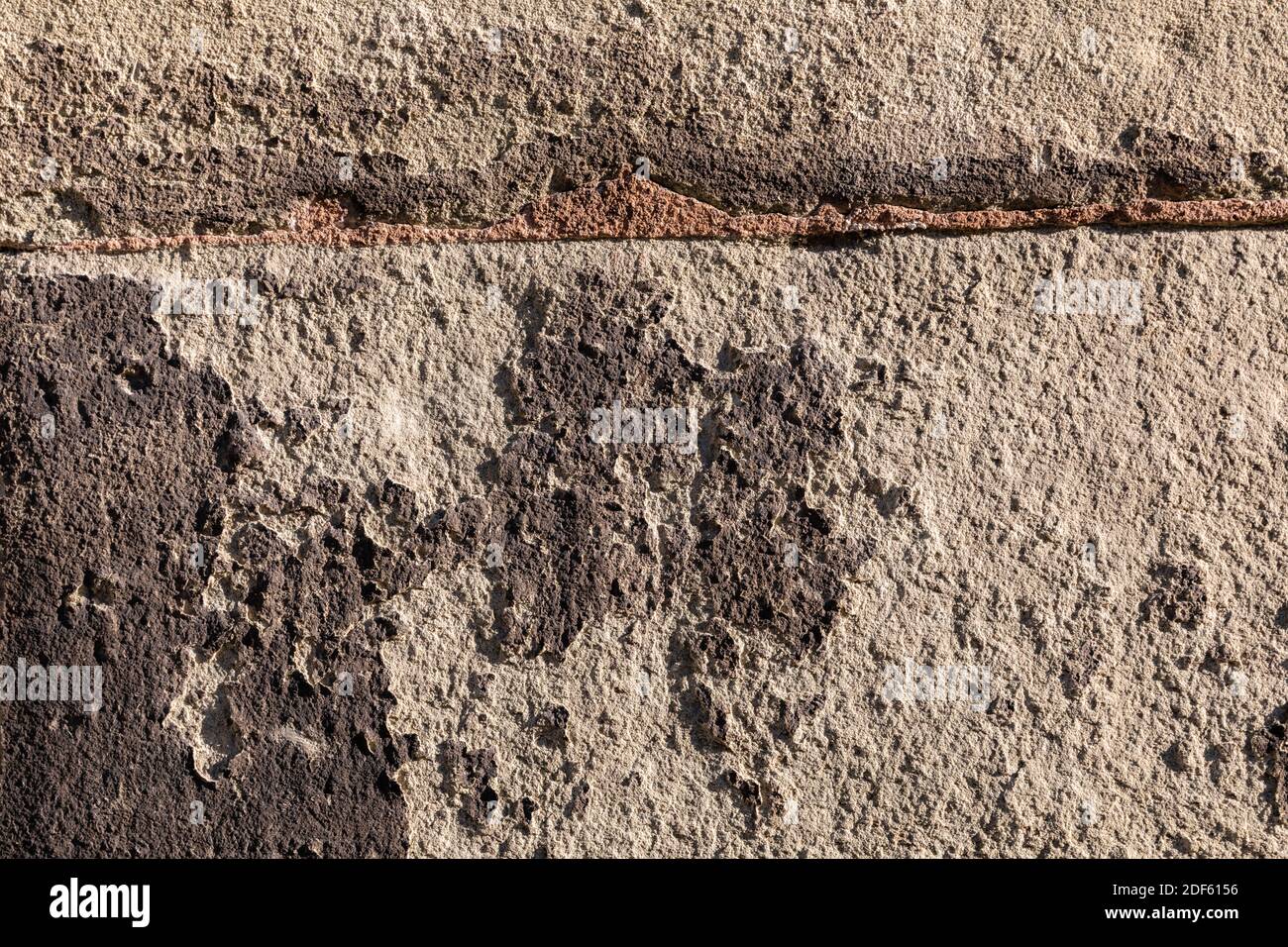 patrones naturales en la antigua pared de arenisca tomada en la antigua ciudad de berna, suiza. Foto de stock