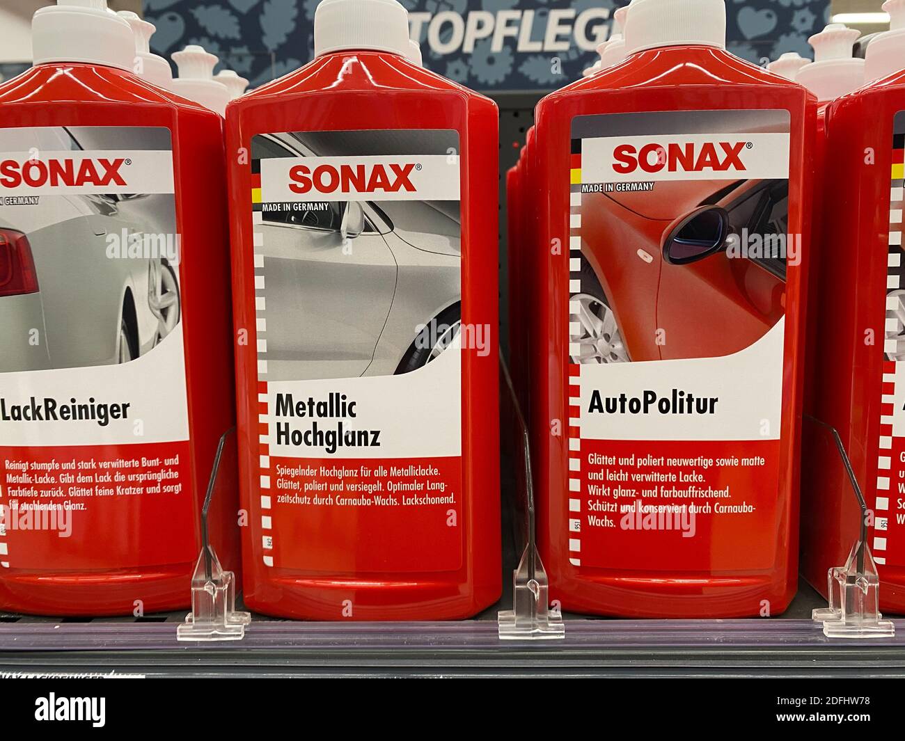 SONAX SX90 Plus aceite multifunción, fondo blanco Fotografía de