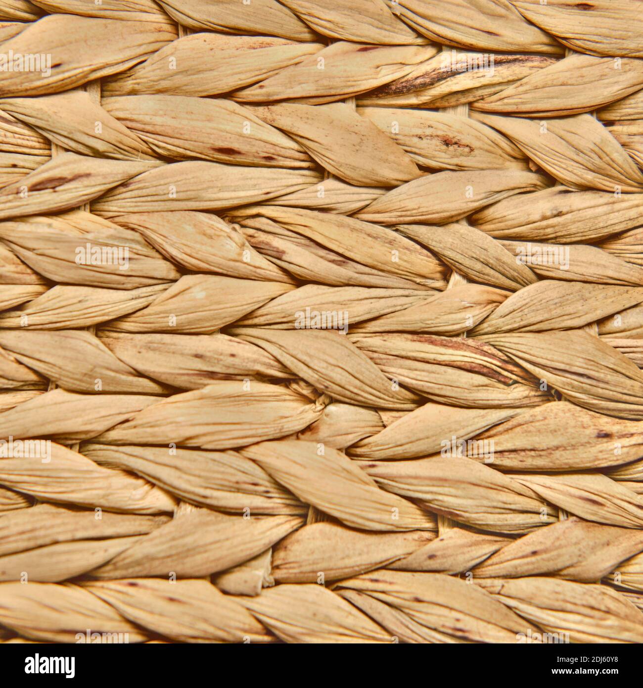 Textura de la superficie de paja tejida, fondo de tela natural hecha de  hojas de planta Fotografía de stock - Alamy
