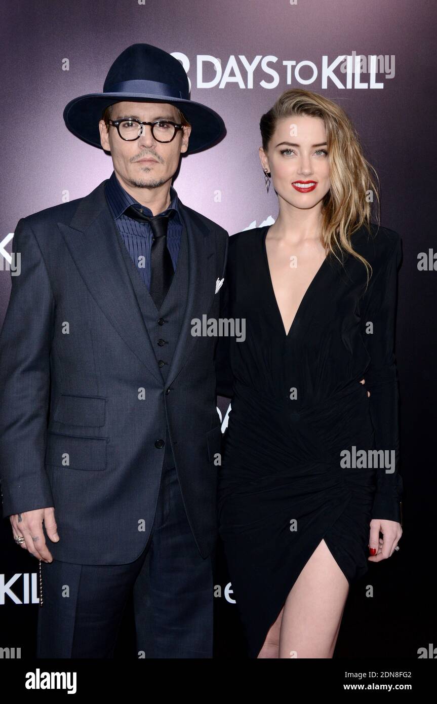 Foto del archivo: Johnny Depp y Amber escucharon hacerlo legal en su casa  en los Ángeles el martes, dice la gente mag. Una boda más grande todavía  está por venir este fin