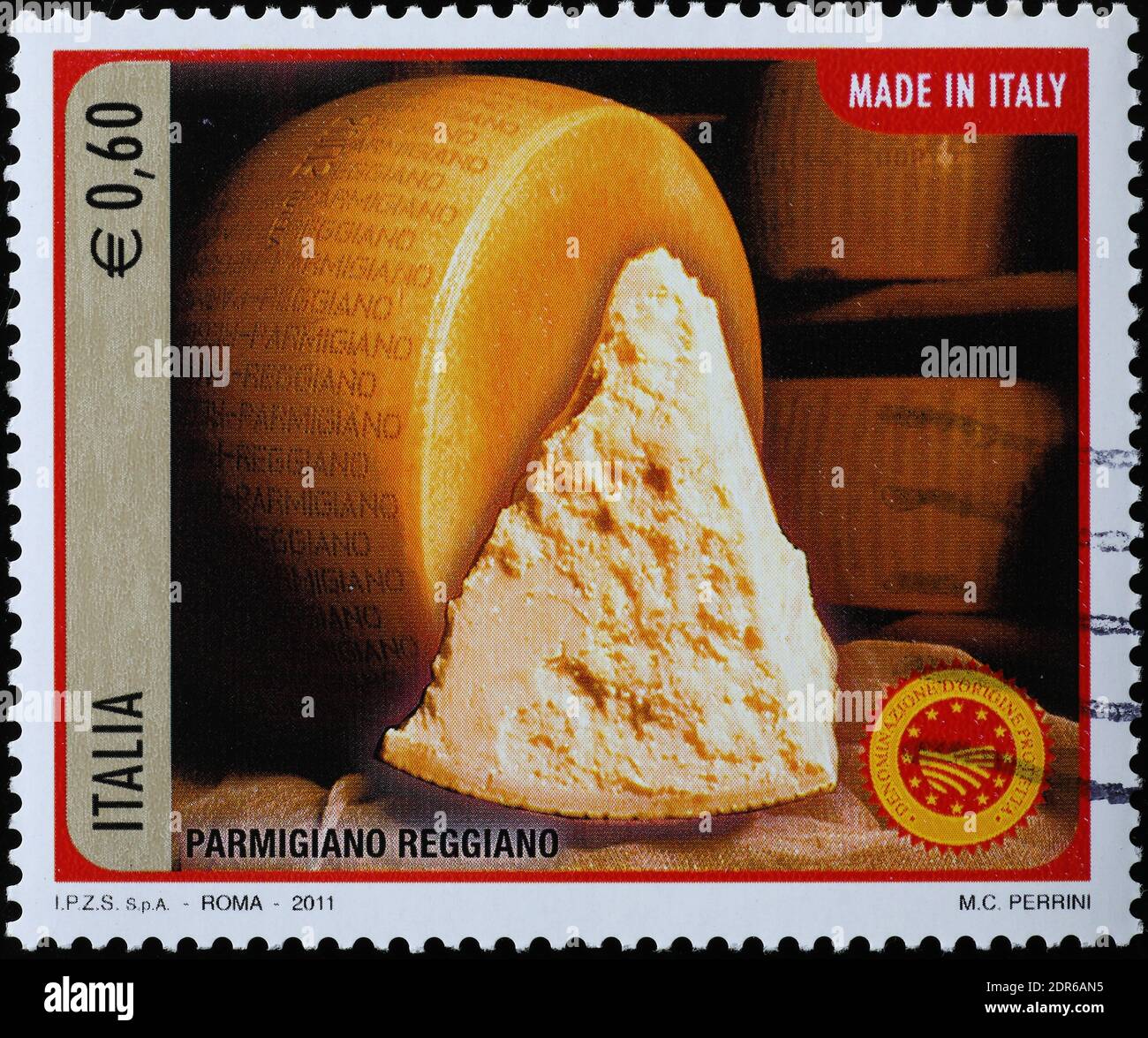 Queso italiano Parmigiano Reggiano en sello postal Foto de stock