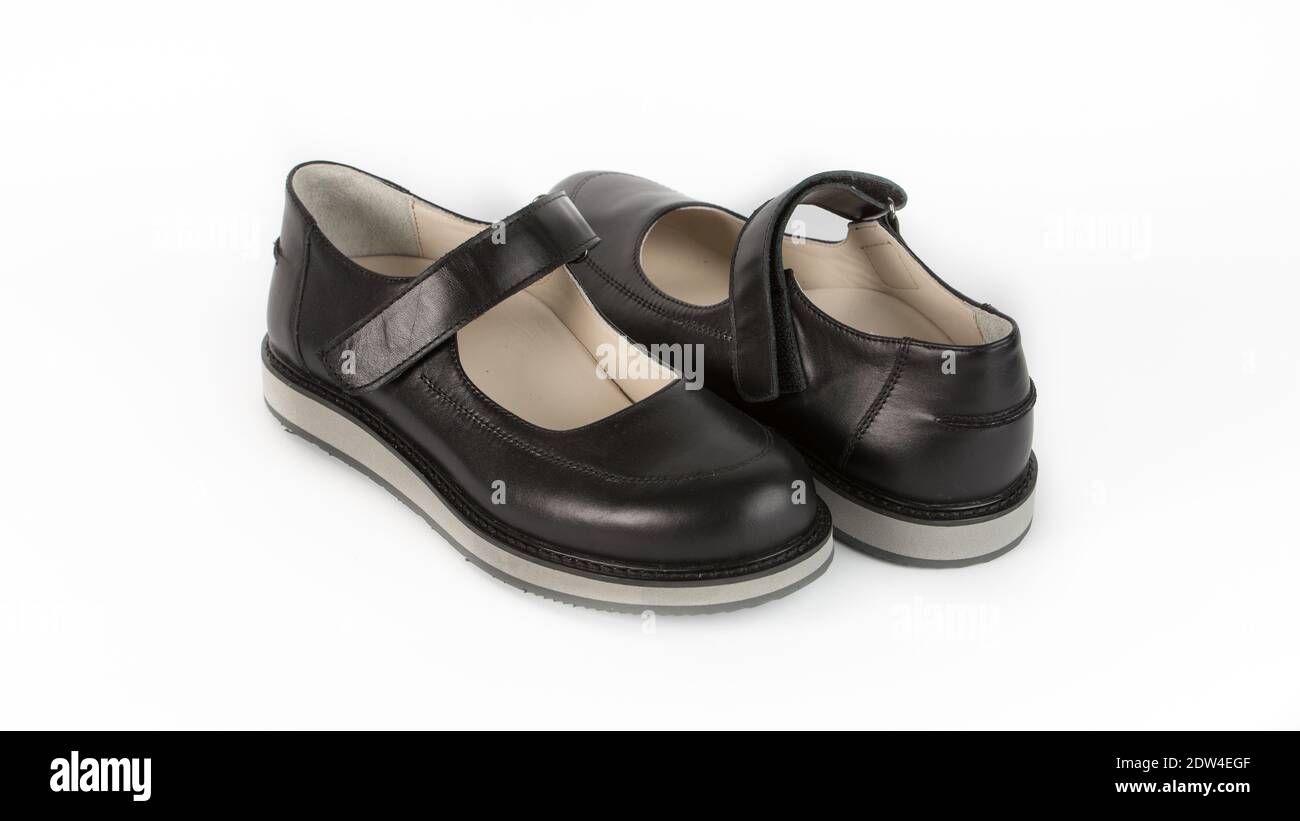 sandalias ortopédicas negras para niños sobre fondo blanco Fotografía de  stock - Alamy