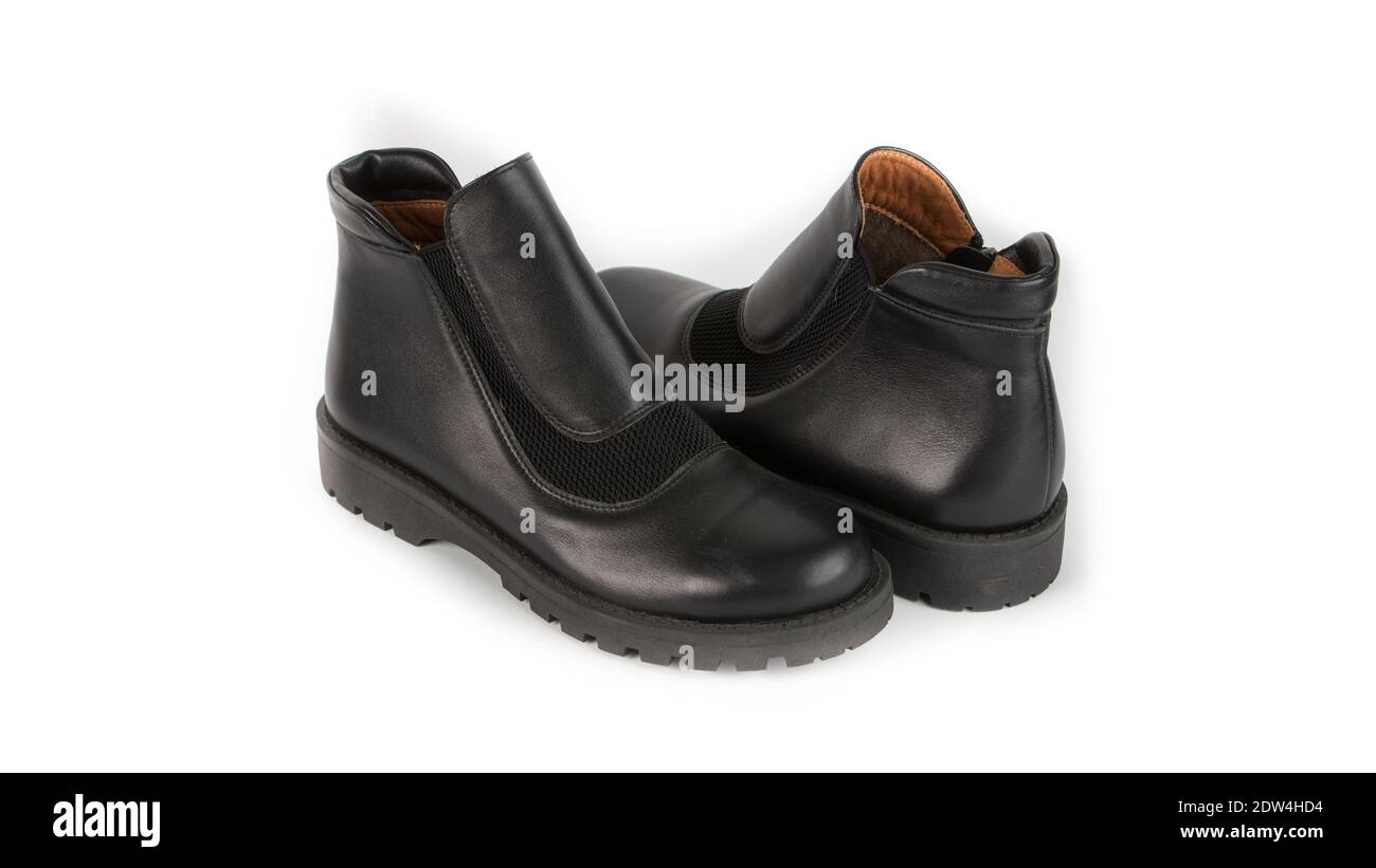 zapatos ortopédicos negros para niños sobre fondo blanco Fotografía de  stock - Alamy