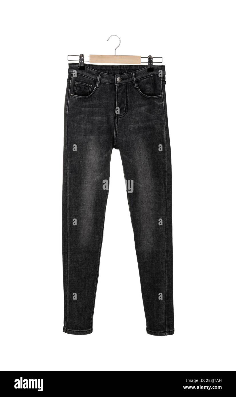 Jeans de invierno cálidos de color gris oscuro para mujer en una percha  aislada sobre fondo blanco Fotografía de stock - Alamy