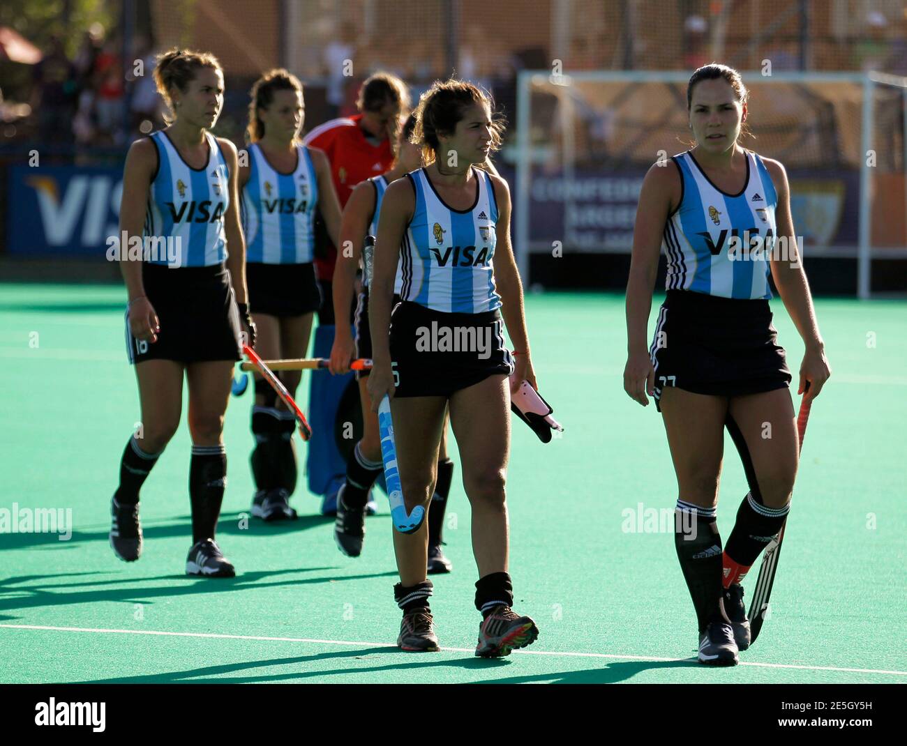 Argentina S Noel Barrionuevo R And Giselle Kanevsky L Lead Their Team Off The Pitch After They Were Defeated By Australia During Their Final Match At The Four Nations Women S Field Hockey Tournament