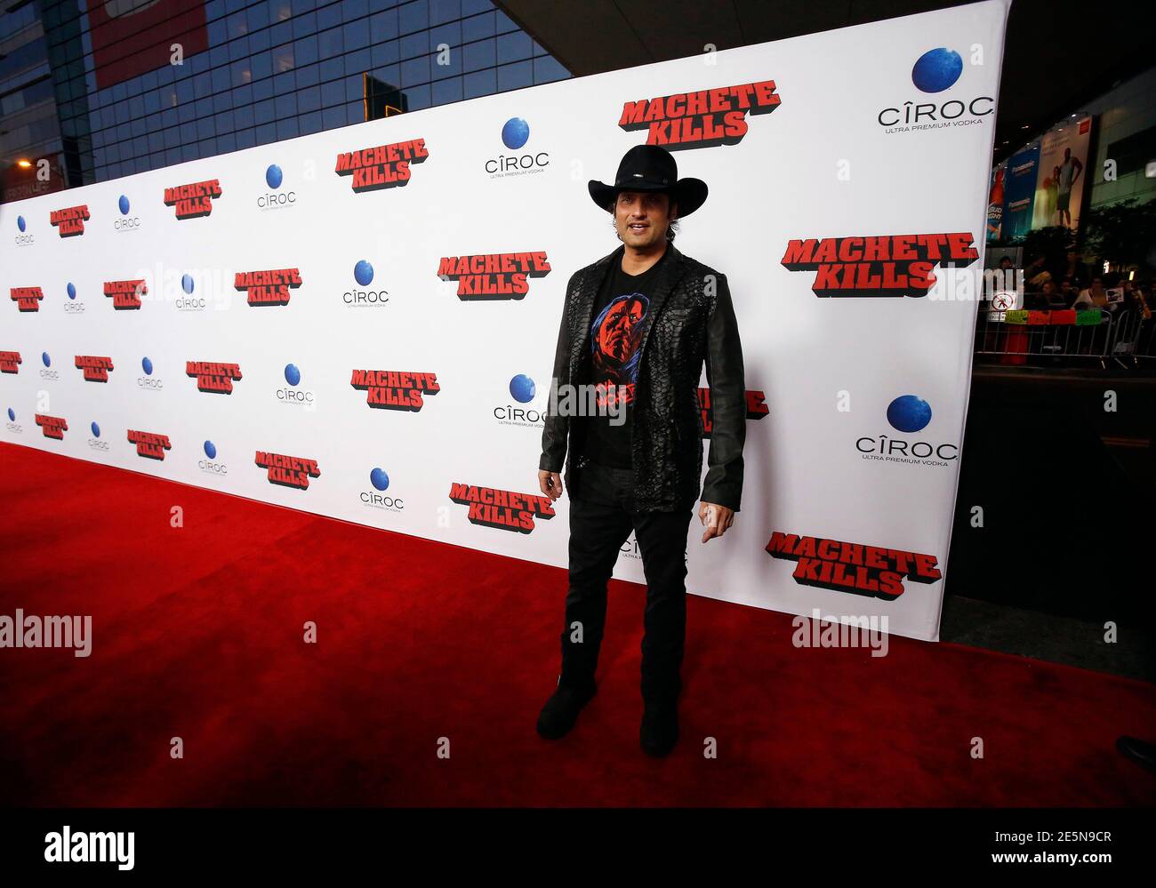 Director of the movie Robert Rodriguez poses at the film premiere of " Machete Kills" in Los Angeles, California October 2, 2013. The movie opens  in the U.S. on October 11. REUTERS/Mario Anzuoni (