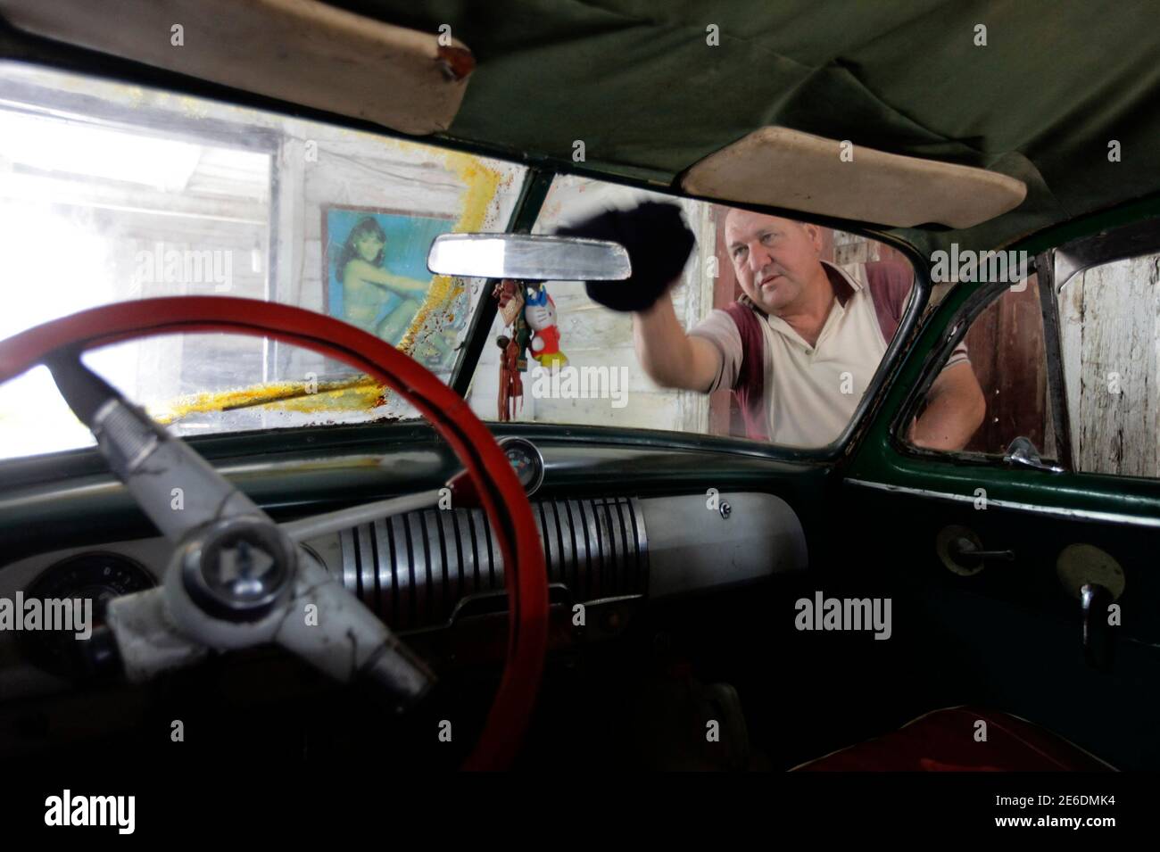 Fidel Roque Polishes The U S Made 1952 Chevrolet Car He Affectionately Named Miss Green And Parks In His Living Room In The Village Of Sagua La Grande 240 Km 149 Miles East Of Fidel Roque Polishes The U S Made 1952 Chevrolet Car He Affectionately Named Miss Green And Parks In His Living Room In The Village Of Sagua La Grande 240 Km 149 Miles East Of