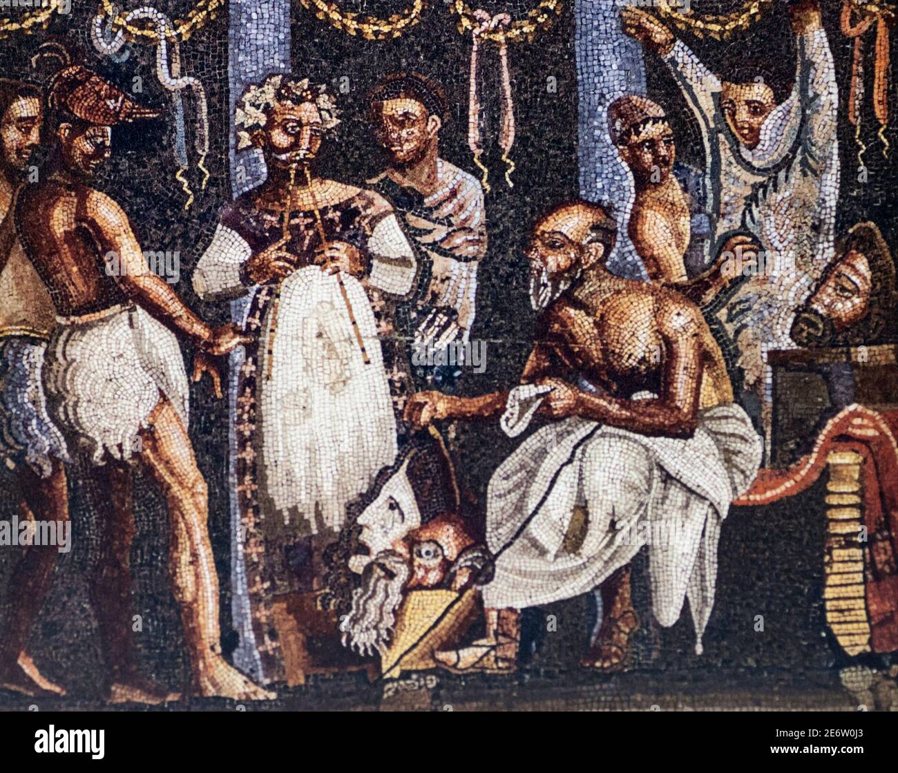 Mosaico que representa a actores del tablinum preparándose para una actuación. Reproducción en MNAR, España. Original en el Museo Arqueológico Nacional de Napl Foto de stock