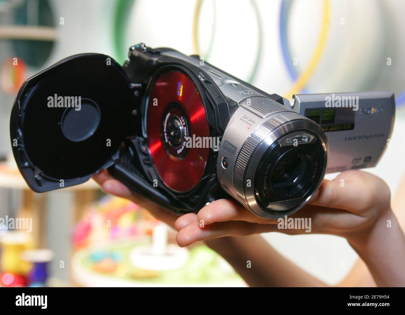 Sony Corp's new digital high-definition video camera 'HDR-UX1' is displayed  during an unveiling in Tokyo July 19, 2006. The camera, which records on 8cm  DVD discs, will go on sale worldwide from