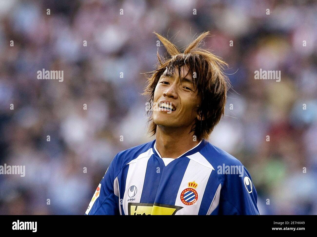 Espanyol's player Shunsuke Nakamura after failed his to goal against Xerez CF goalkeeper Renan Brito during their first division soccer match at Cornella-El Prat stadium in Barcelona 27,
