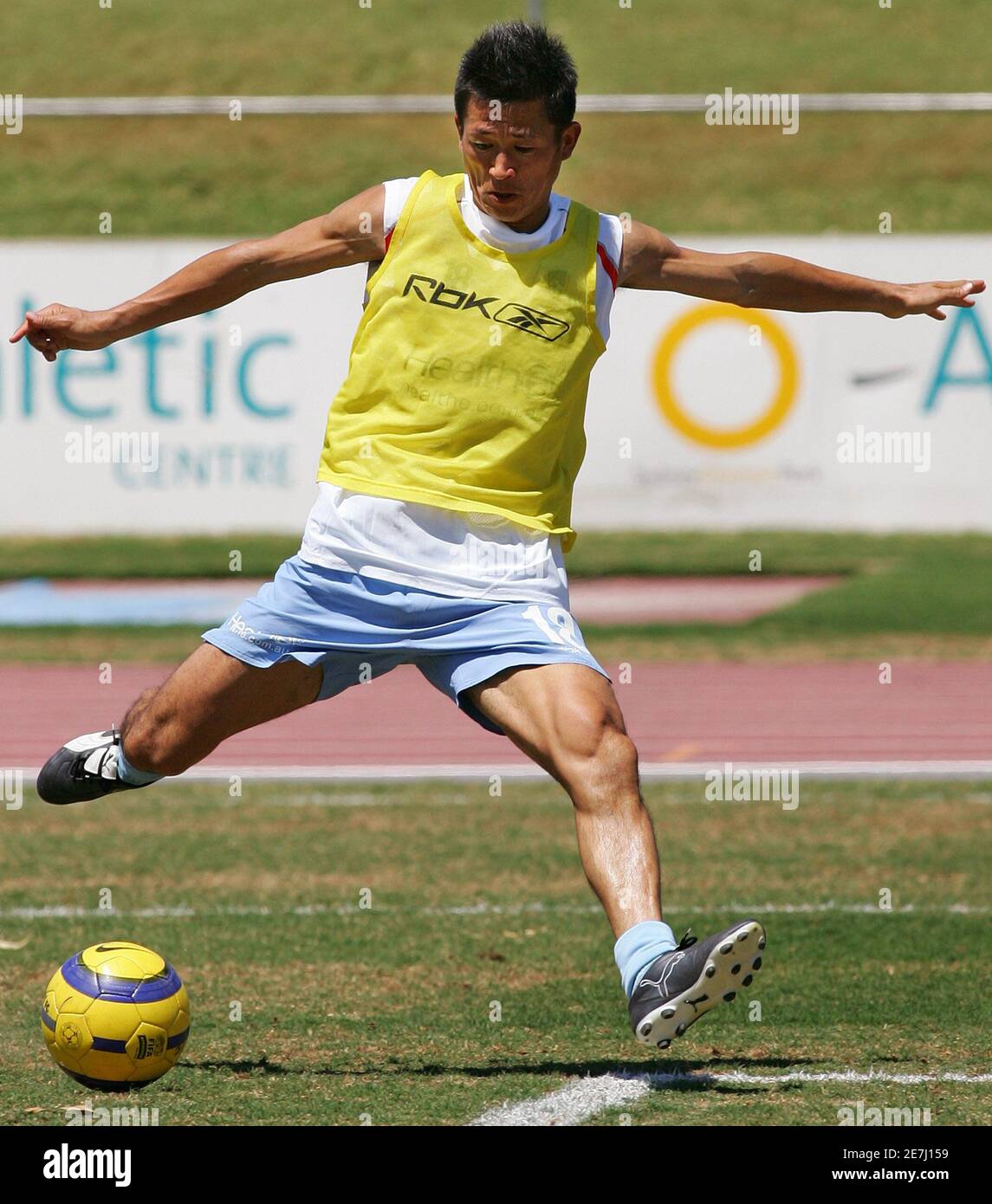 Japanese Soccer Super Star Kazuyoshi Kazu Miura R Follows His Wife Risako Miura And Son Kota After Arriving In Sydney November 8 05 Miura Is A Sydney Football Club S Guest Player And