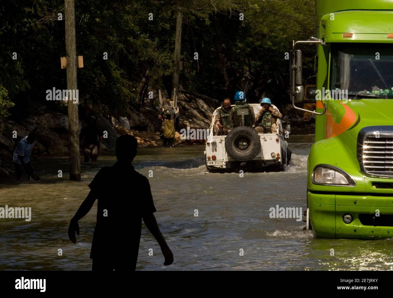 UN peacekeepers from Jordan patrol a flooded road at the border between  Haiti and Dominican Republic, in the zone know as Malpasse, October 16,  2008. The Security Council extended the mandate of