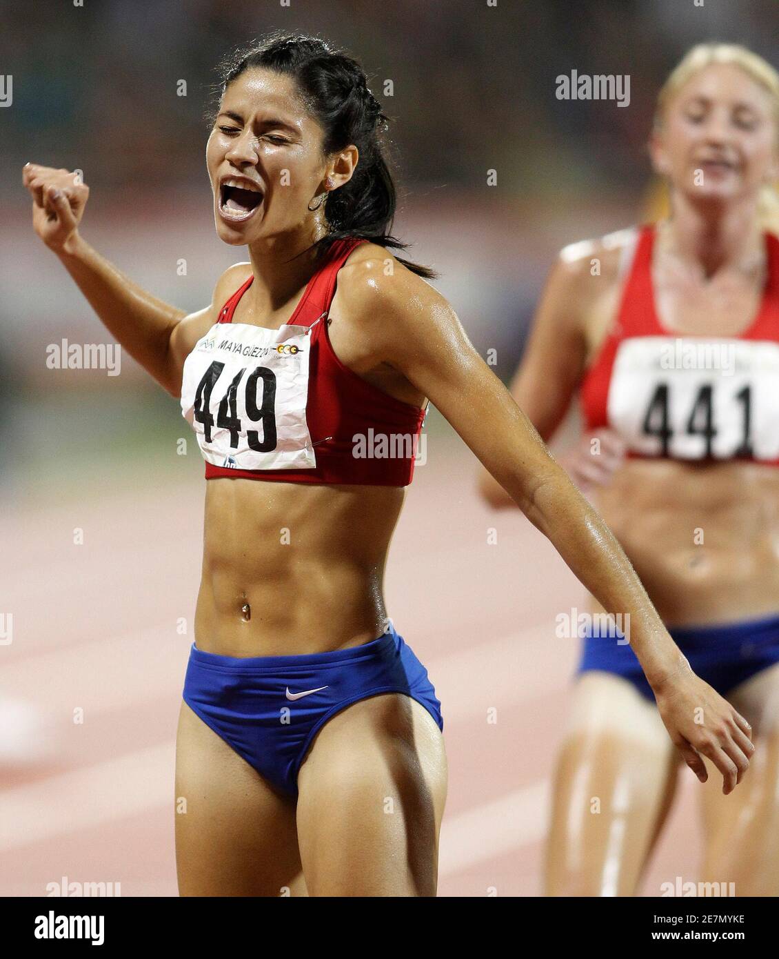 Puerto Rico's Beverly Ramos celebrates after winning the women's 5,000m  final event at the Central American and Caribbean games in Mayaguez July  29, 2010. REUTERS/Juan Carlos Ulate (PUERTO RICO Fotografía de stock -