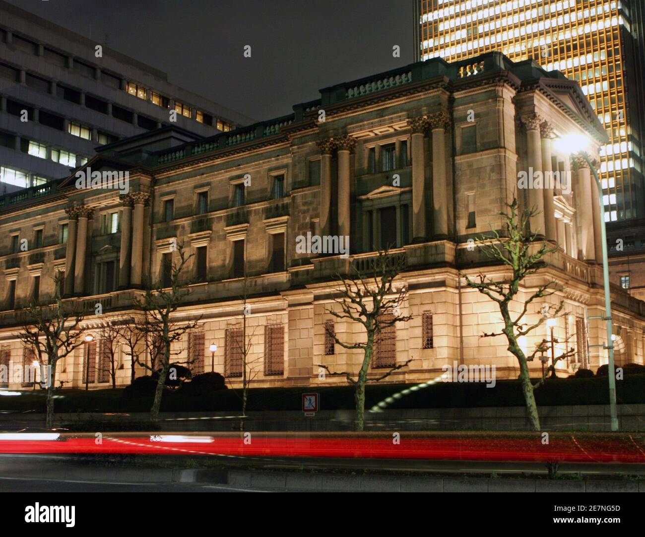 The Bank of Japan (BOJ) building is lit up in Tokyo March 7, 2006. Japan's  government kept up its pressure on the BOJ on Tuesday, a day before the  start of a