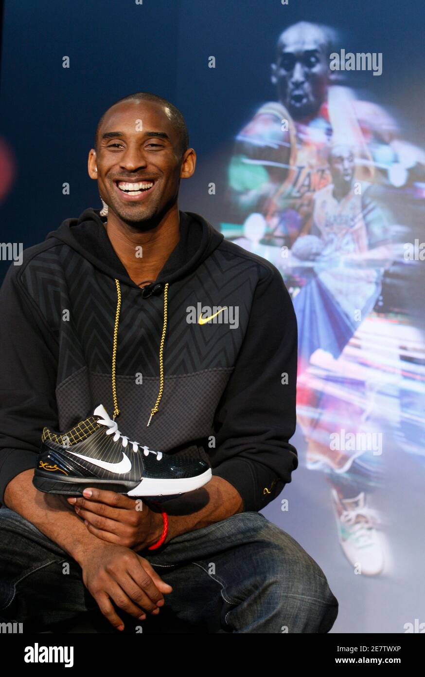 Los Angeles Lakers NBA star Kobe Bryant speaks at a webcast to unveil his  new Nike Zoom Kobe IV basketball shoe in Los Angeles, December 11, 2008.  The shoe will be available
