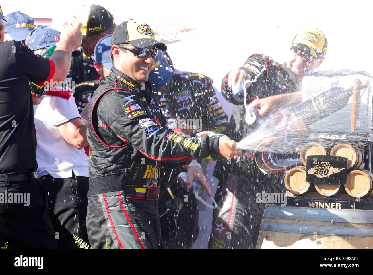 juan-pablo-montoya-celebrates-winning-the-nascar-toyota-savemart-350-at-infineon-raceway-in-sonoma-california-june-24-2007-reuters-robert-lesieur-united-states-2e82ae8.jpg