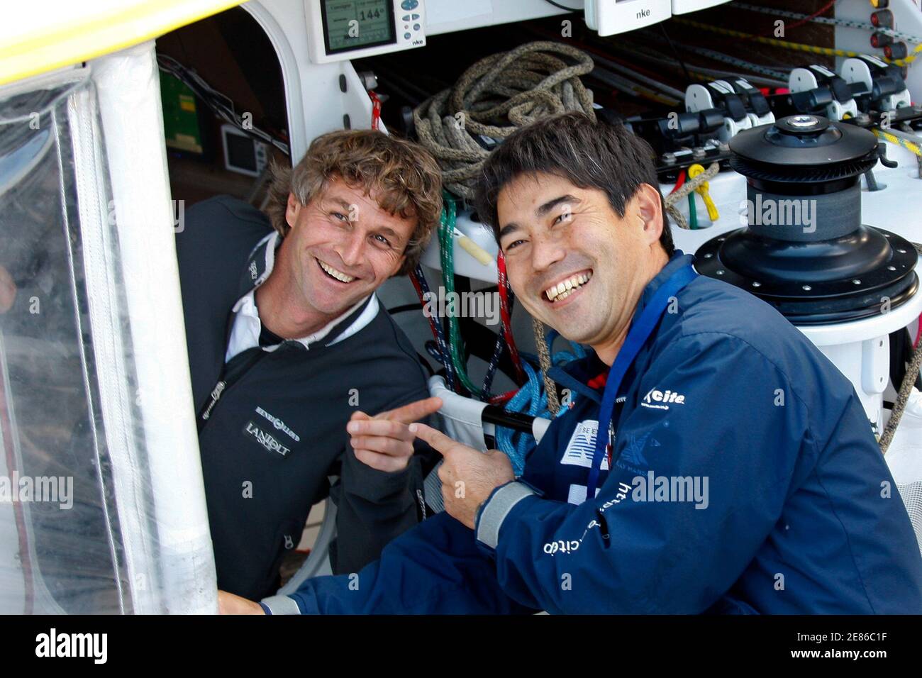 Swiss Skipper Bernard Stamm L Gets A Visit Of Japanese Skipper Korijo Shiraishi At Les Sables D Olonne On France S Atlantic Coast November 6 08 The Vendee Globe S 6th Edition A Single Handed Non Stop