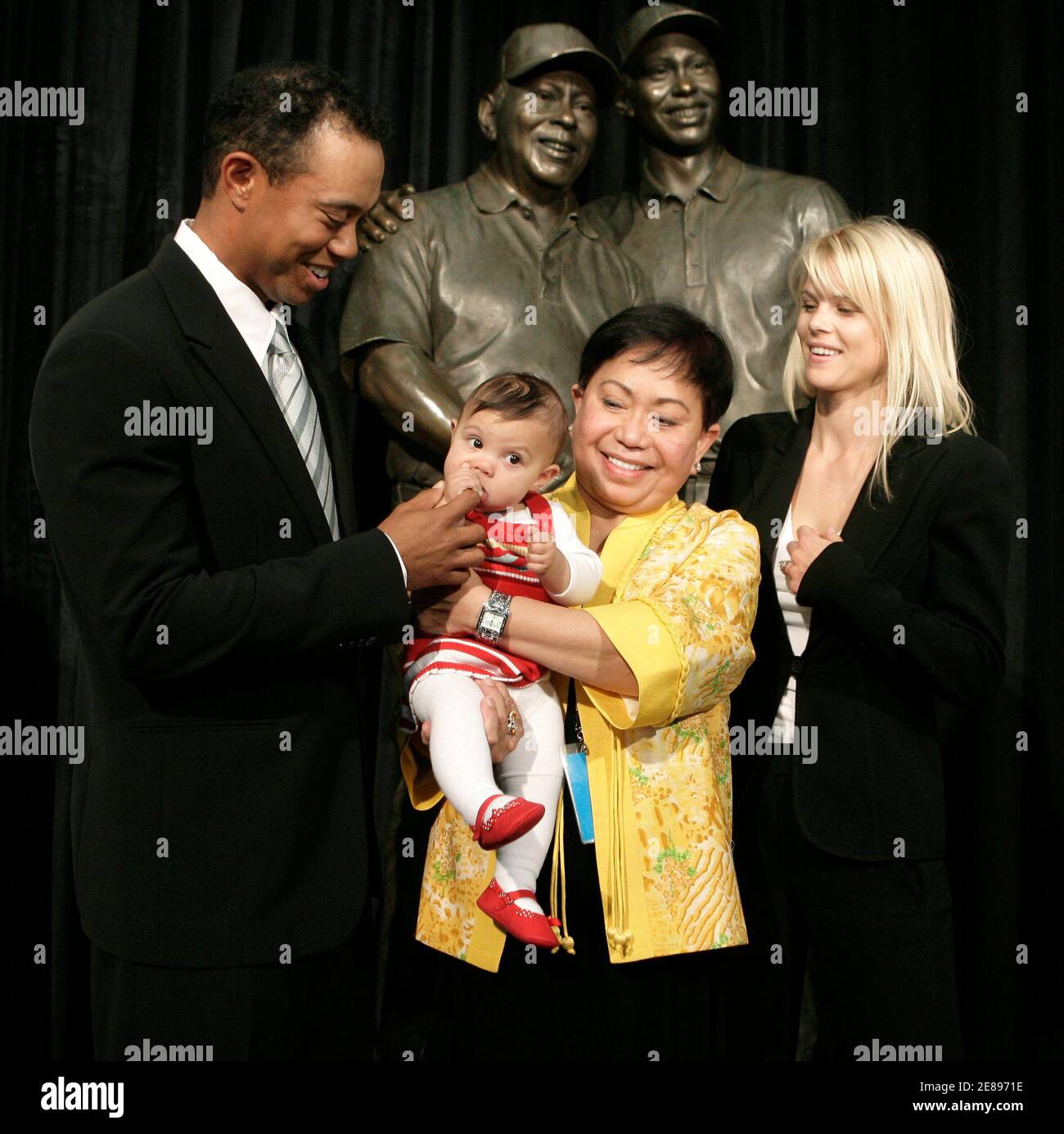 Golfer Tiger Woods (L), his daughter Sam, his mother Kultida and his