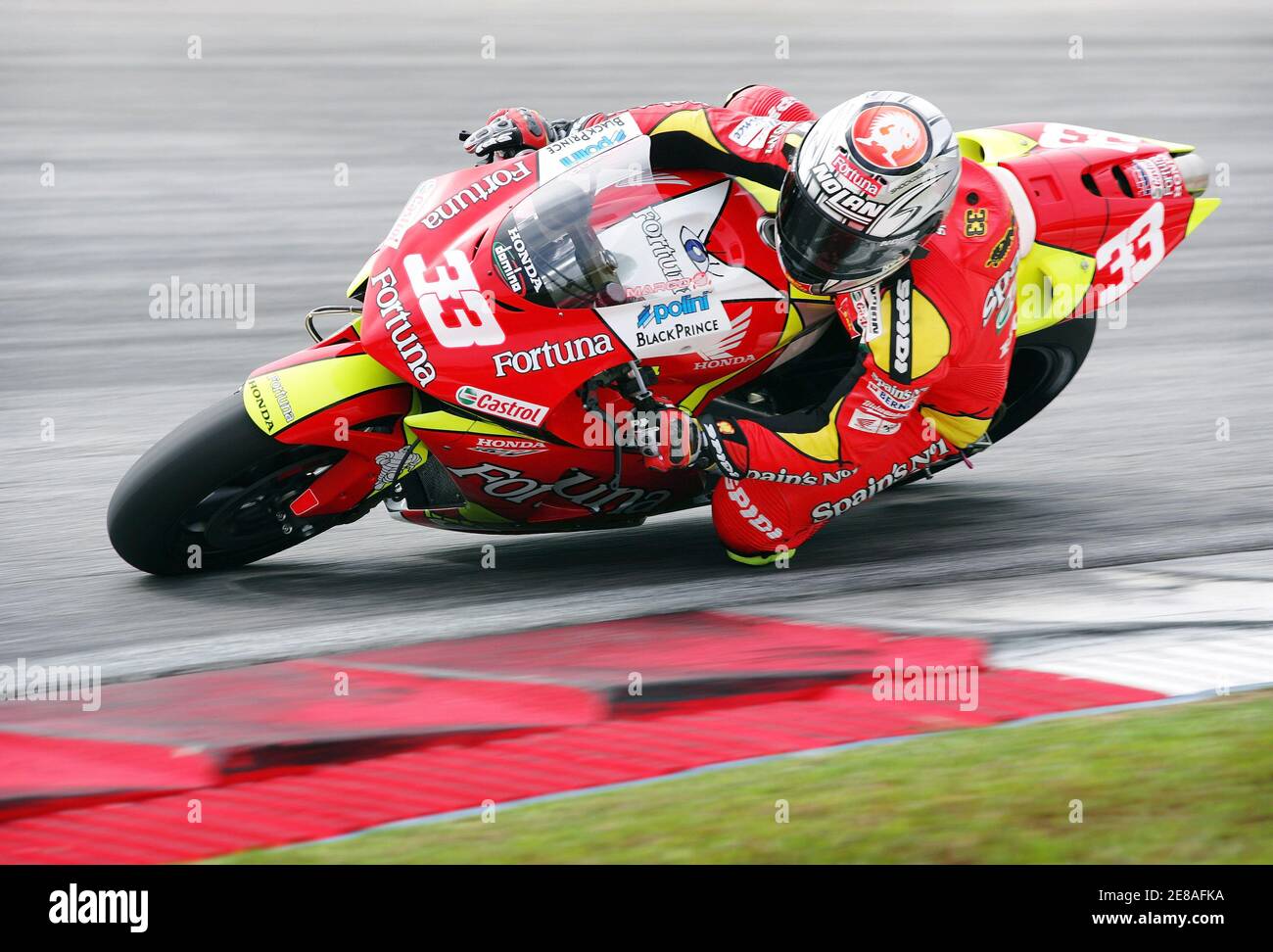 Honda MotoGP rider Marco Melandri of Italy takes a corner during a 