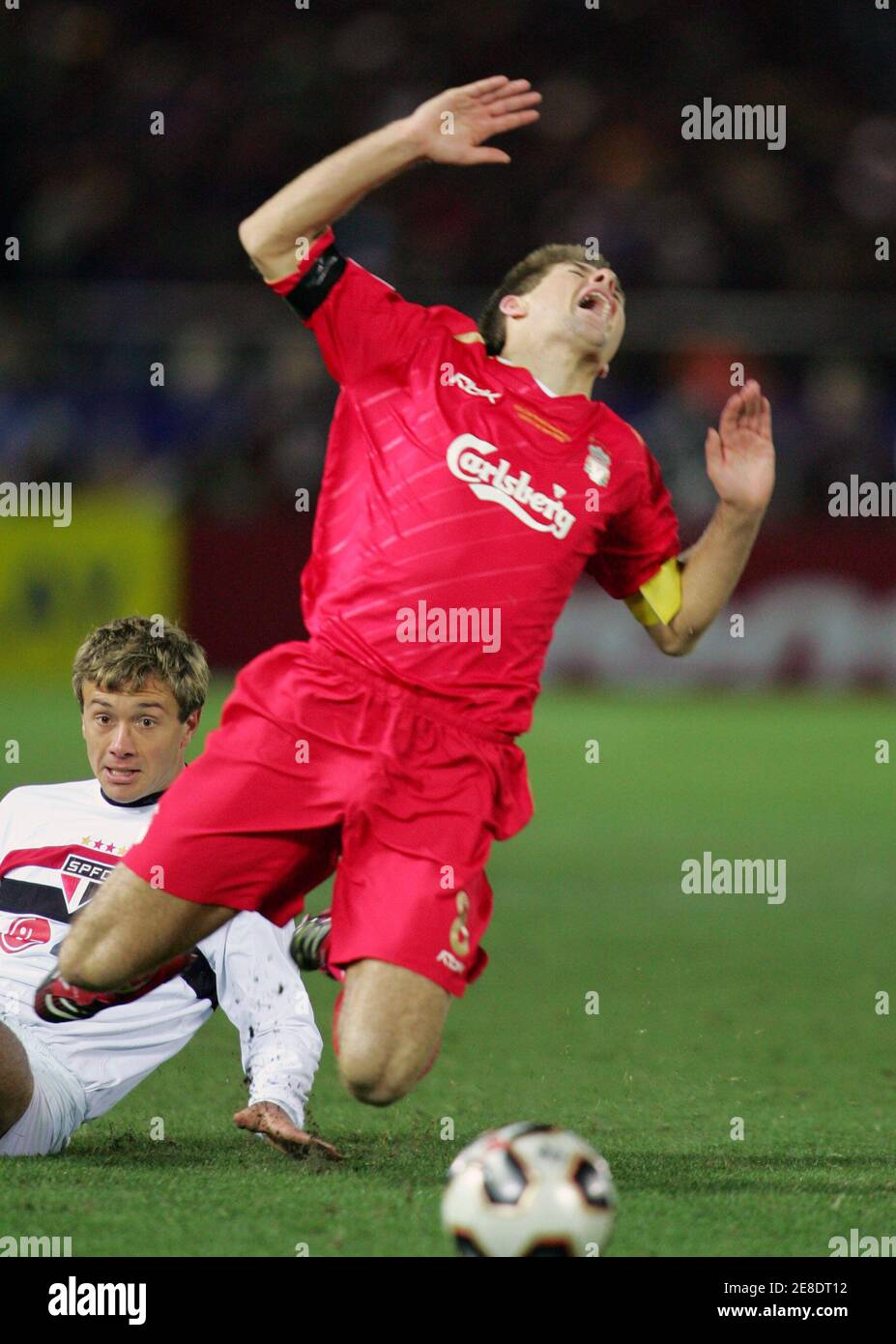 Sao Paulo Fc Defender Diego Lugano Tackles L Liverpool Fc Captain Steven Gerrard During The Fifa Club World Championship Soccer Final At Yokohama International Stadium In Yokohama South Of Tokyo December 18