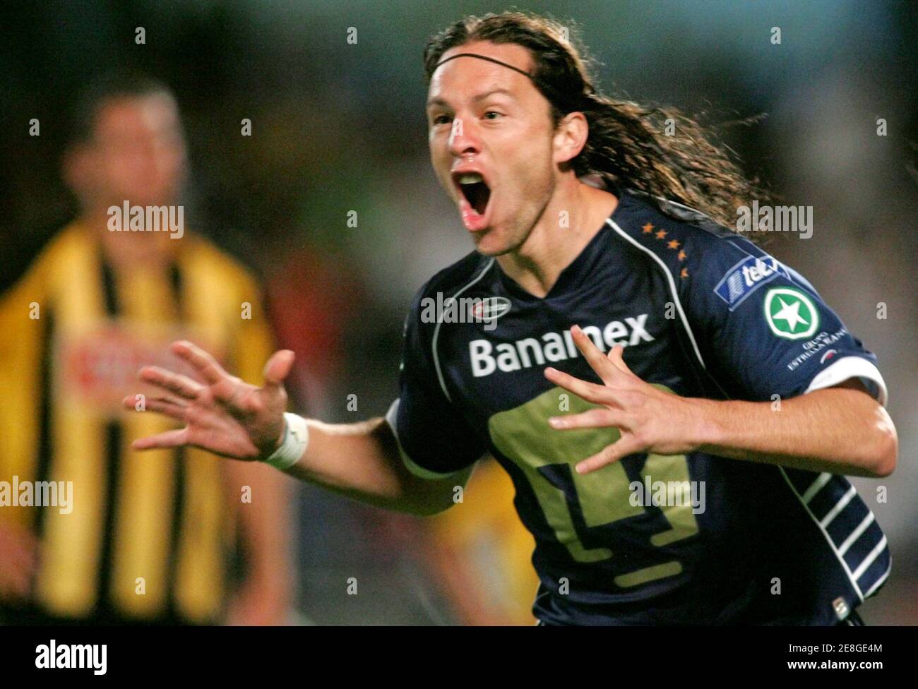 Pumas' Antonio de Nigris celebrates after scoring against The Strongest of  Bolivia during the first half of their Copa Sudamericana soccer match at  the University stadium in Mexico City September 20,2005. REUTERS/Daniel