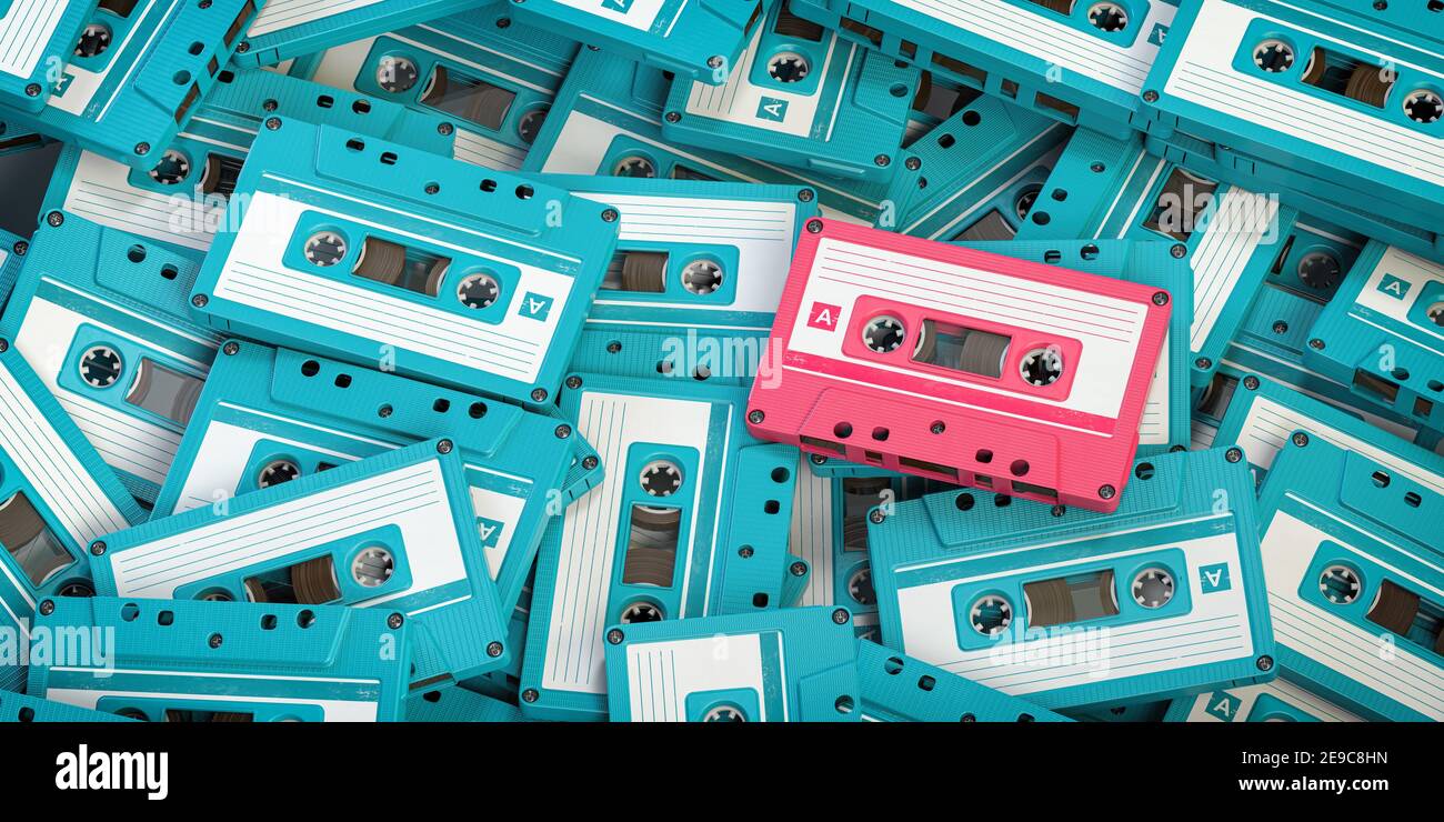 Casetes de audio de color azul vintage y una única cassete rosa. Concepto creativo retro de individualidad. ilustración 3d. Foto de stock