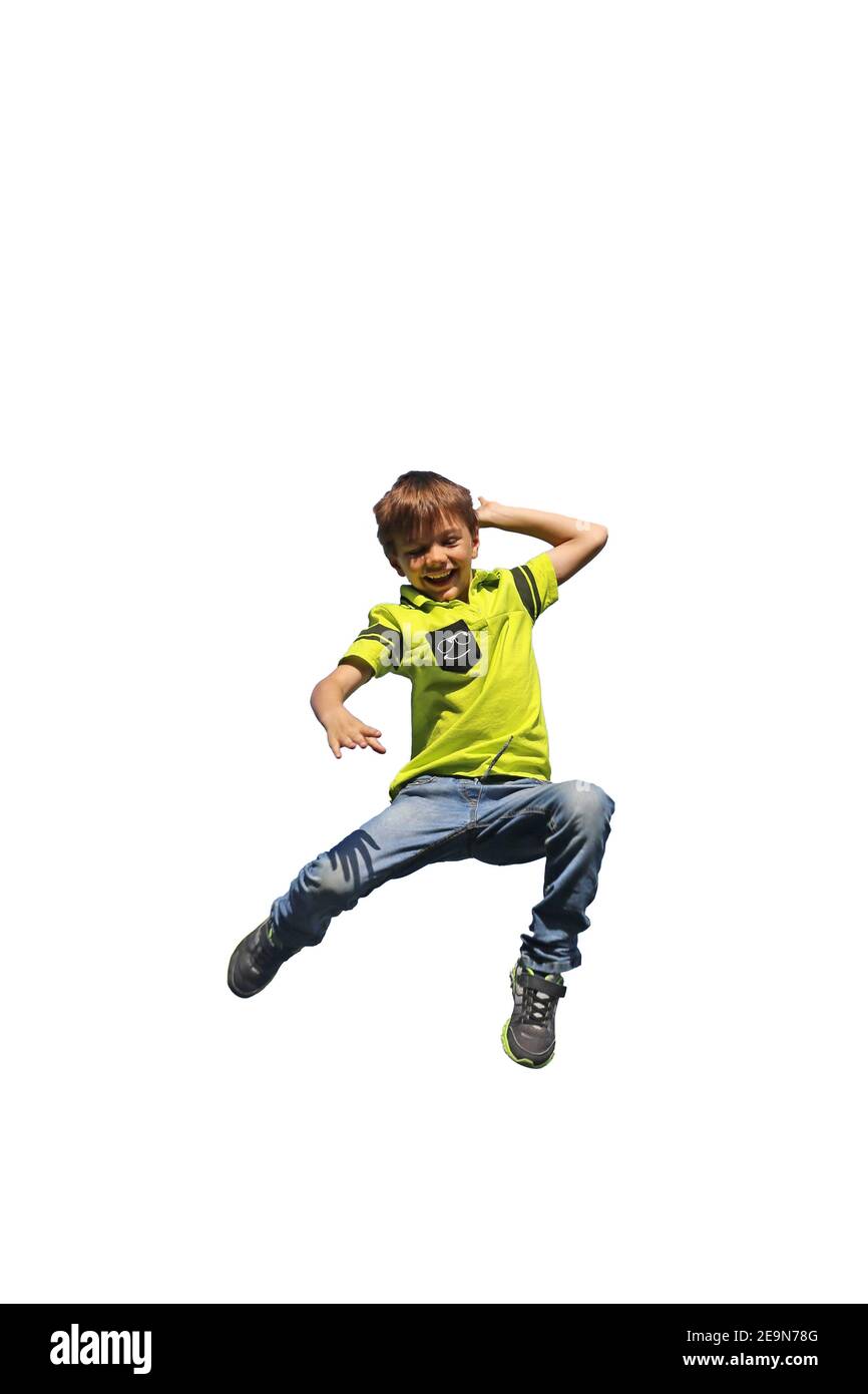 Niño salta en el aire (fondo blanco), modelo liberado Foto de stock