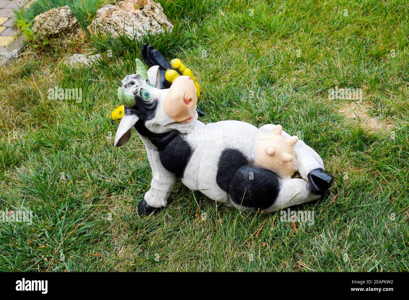 Acostado boca ubre de la vaca de juguete Foto de stock