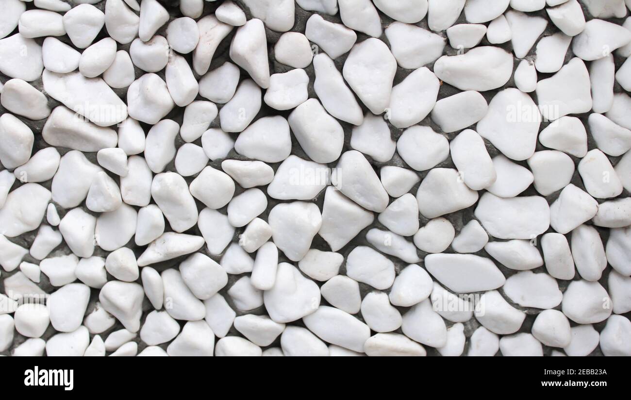 Textura de piedra blanca, muchas piedras blancas en el mar Fotografía de  stock - Alamy