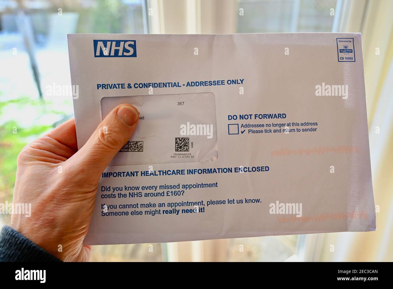 Carta de vacunación del NHS COVID-19. Foto de stock