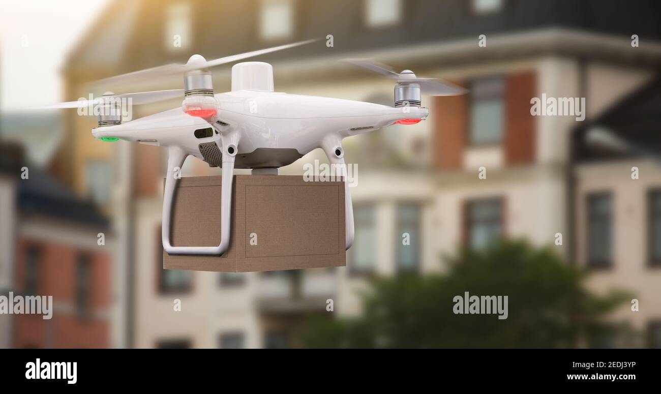 Drone con un paquete. Concepto de entrega no tripulada Foto de stock