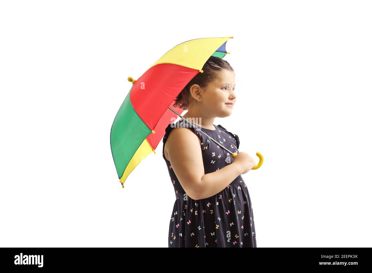 Chica sosteniendo un paraguas de colores aislados sobre fondo blanco Foto de stock
