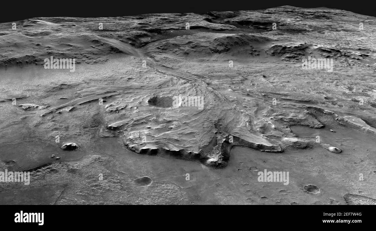 La ilustración del folleto representa un área posible a través de la cual el mars 2020 persistance rover podría atravesar Jezero Cráter mientras investiga varios ambientes antiguos que alguna vez han sido habitables. La ruta comienza en los acantilados que definen la base de un delta producido por un río mientras fluía en un lago que una vez llenó el cráter. A continuación, el camino recorre el delta hacia posibles yacimientos de la costa antigua y, a continuación, sube al borde del cráter de 2,000 metros (610 pies de altura) para explorar las llanuras circundantes. Alrededor de la mitad de este recorrido podría completarse en perseverancia Foto de stock