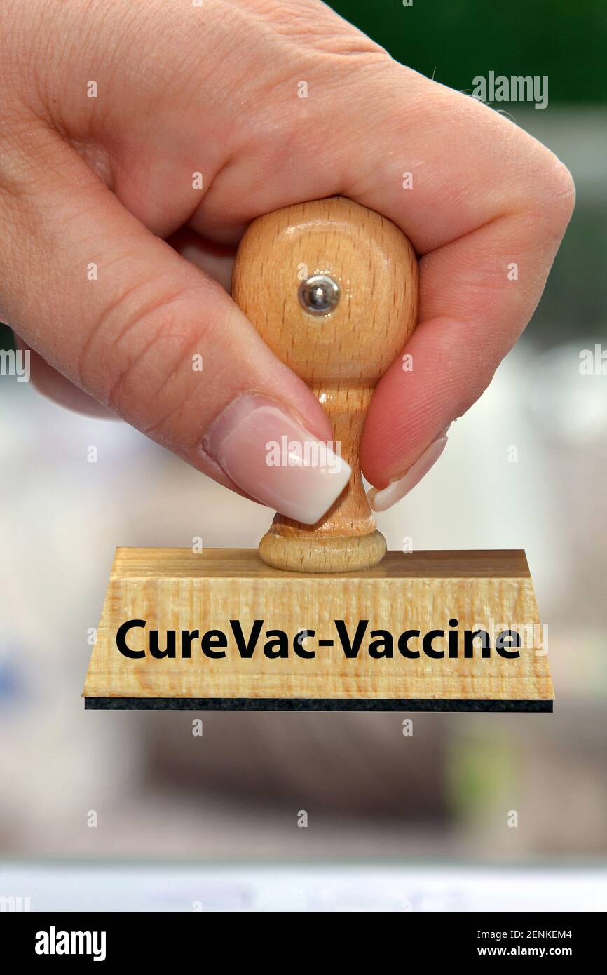 Stempel, Holzstempel, Aufschrift: CureVac, Impfstoffhersteller, Pharmaunternehmen, Covid-19 Impfstoff, Forschung, mRNA-Impfstoff, mRNA, Caccine, Vakz Foto de stock