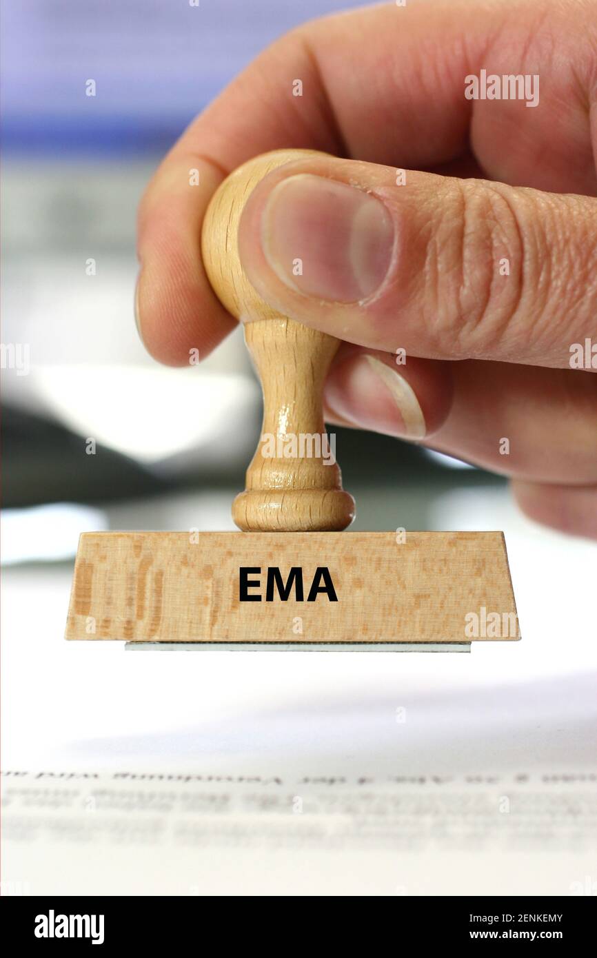 Stempel, Holzstempel, Aufschrift: EMA, Agencia Europea de medicamentos, Zulassungsbehörde für Medikamente, Impfstoffe, Europäische Arzneimittel-Agentur, Foto de stock