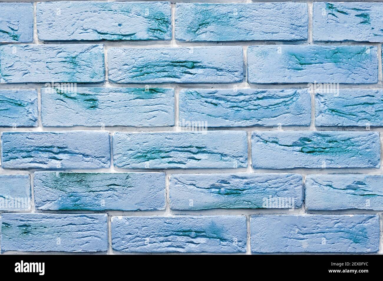 Patrón de fondo sin costuras de ladrillos decorativos azules en la superficie de la pared. Diseño interior y materiales Foto de stock