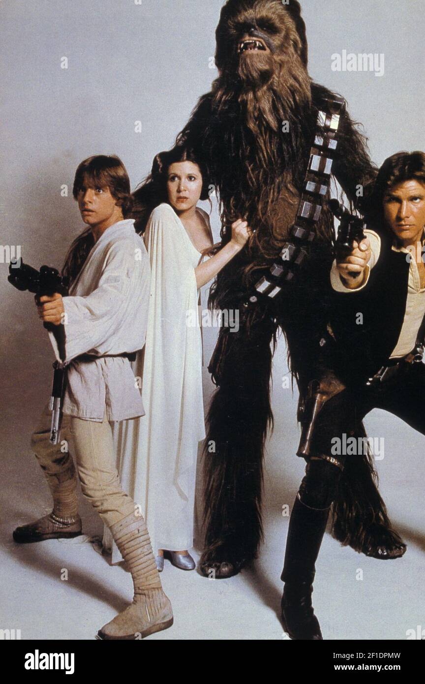 En la mayoría de los casos sufrir mientras tanto Star Wars' (1977) Mark Hamill como Luke Skywalker, Carrie Fisher como la princesa  Leia, Chewbacca, y Harrison Ford como han solo (crédito de la foto: 20th  Century Fox Pictures/Shooting Star) *** por