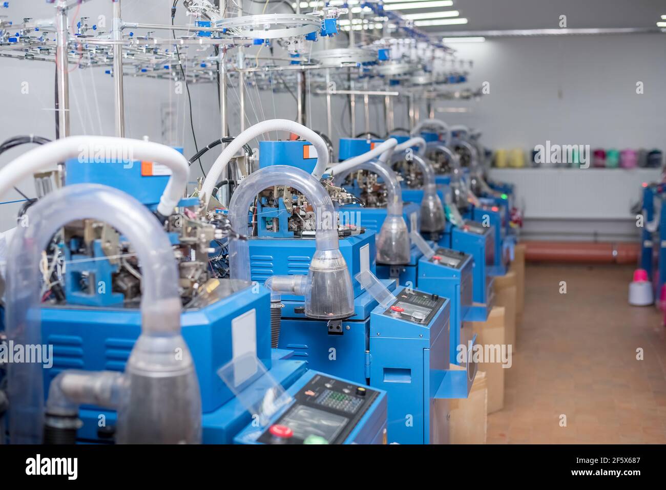 Sock Machines, fábrica de calcetines de punto, línea de producción Fotografía de - Alamy