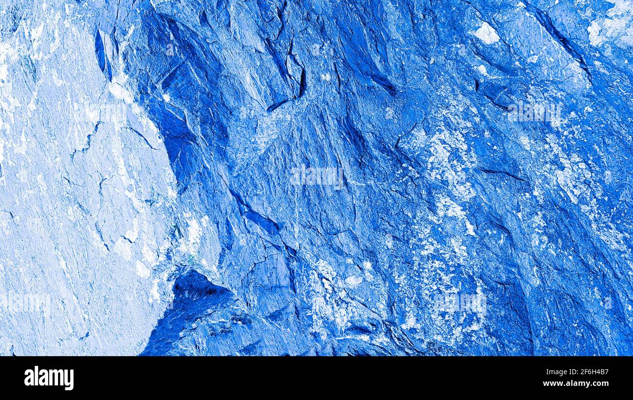 Roca de piedra macro primer plano geología azul ciencia geológica rugoso rugoso sólido duro rocoso cristal cristalino pared ladrillo pared decoración antecedentes Foto de stock