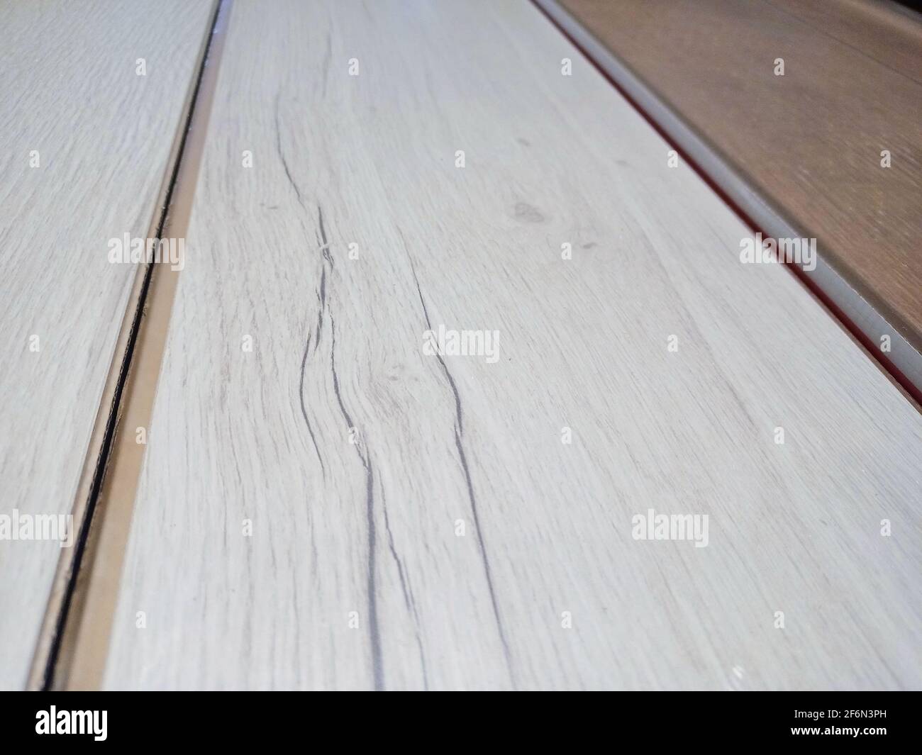 Tablas laminadas en un paquete. Revestimientos de suelo en paquetes