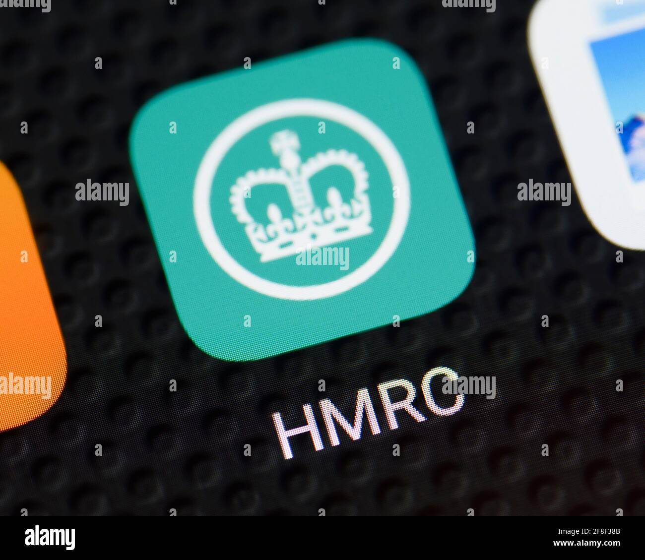 Icono de la aplicación HMRC en un smartphone, Reino Unido Foto de stock