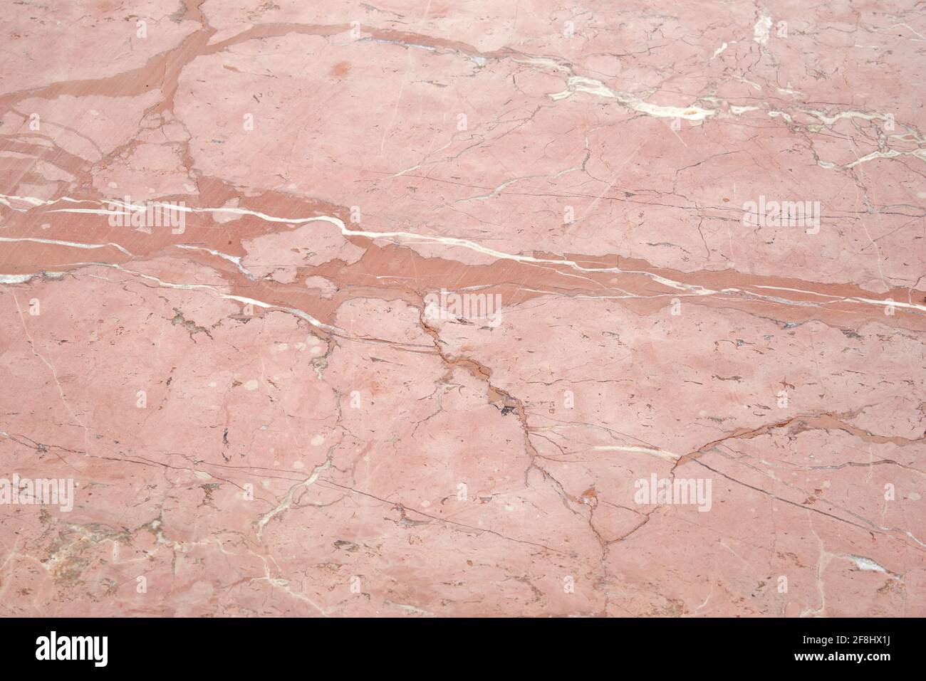 Vista en detalle de mármol rosa pastel texturizado Foto de stock
