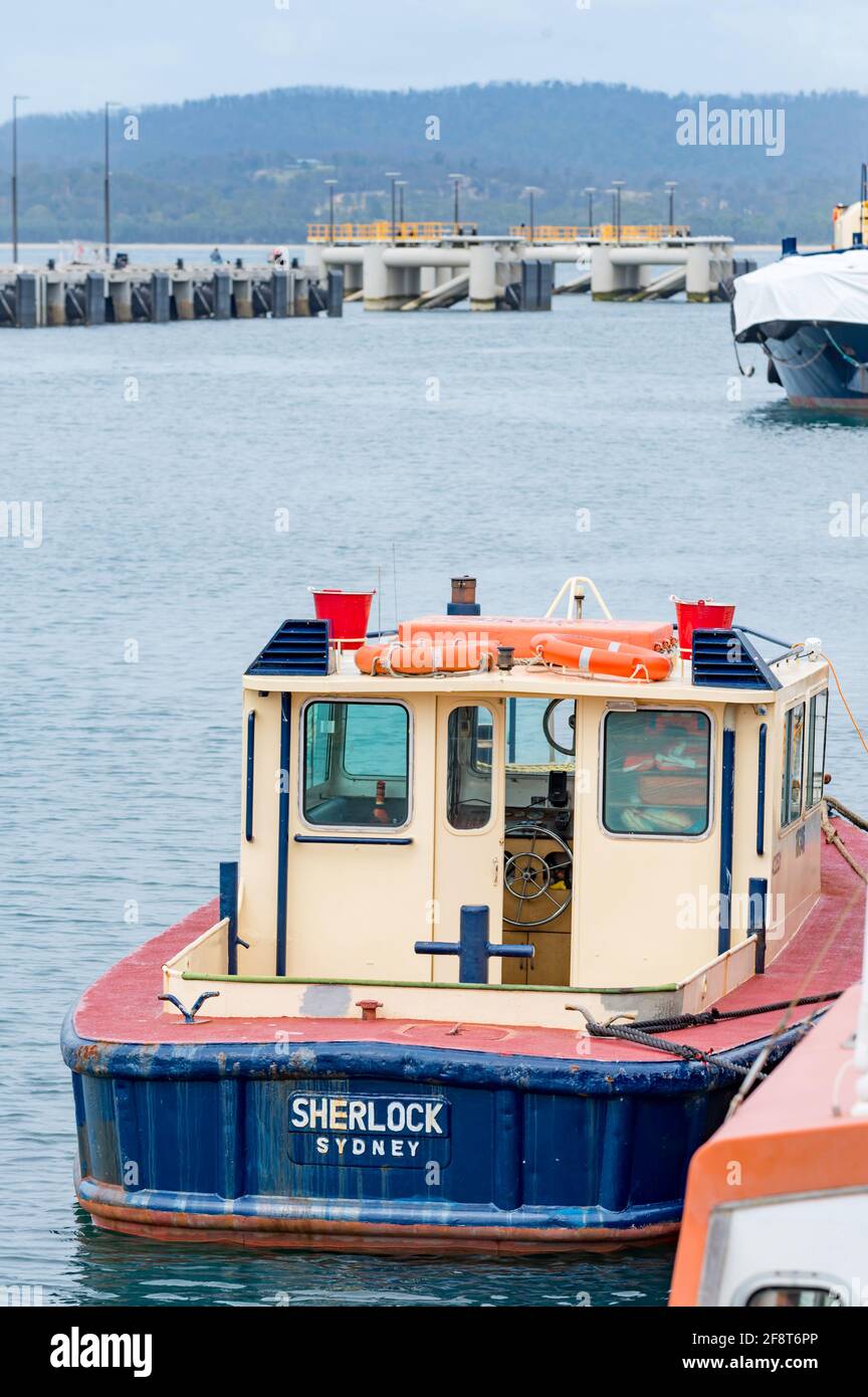 El barco Sherlock, propiedad de Svitzer Australia, visto aquí amarrado en el Puerto de Edén en la costa sur de Nueva Gales del Sur de Australia Foto de stock