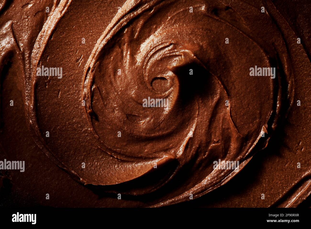 Imagen detallada del remolino de chocolate. Foto de stock